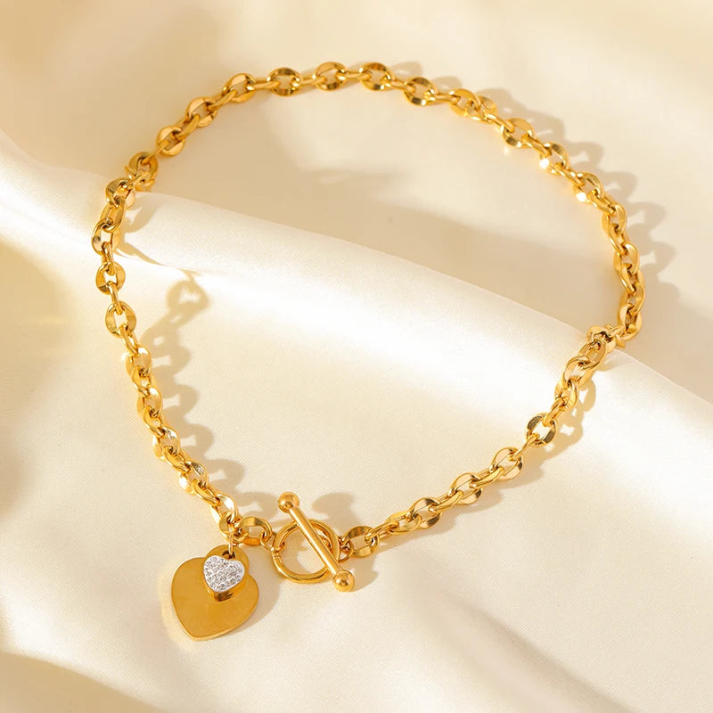 Conjunto Feminino de Colar e Pulseira em Aço Inoxidável 316L – Design de Coração, Estilo Trendy