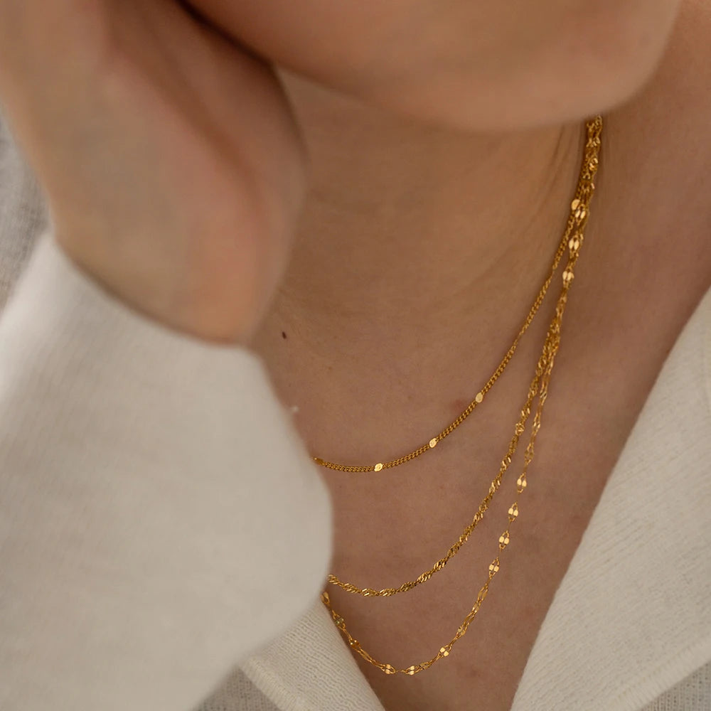 Colar Multicamadas em Aço Inoxidável Dourado – Estilo Trendy e Moderno