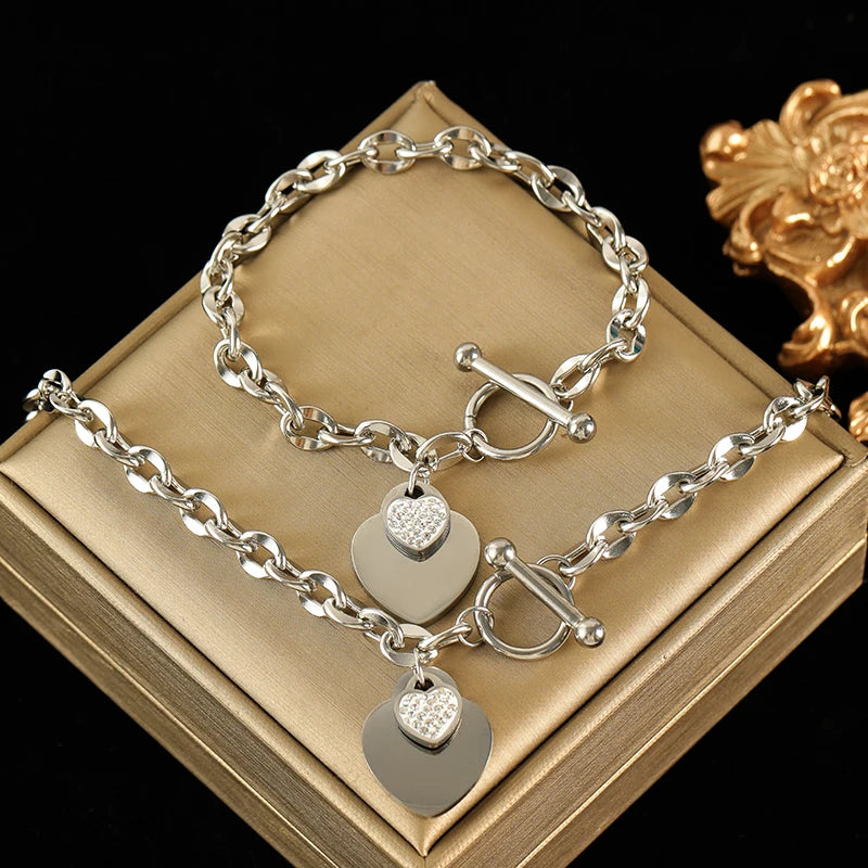Conjunto Feminino de Colar e Pulseira em Aço Inoxidável 316L – Design de Coração, Estilo Trendy