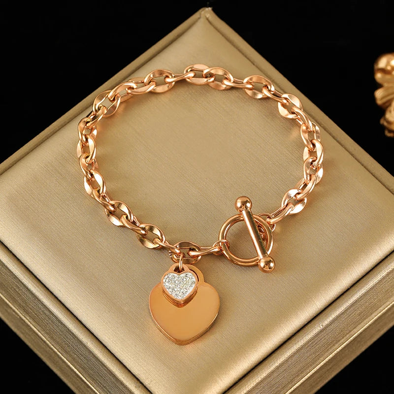 Conjunto Feminino de Colar e Pulseira em Aço Inoxidável 316L – Design de Coração, Estilo Trendy