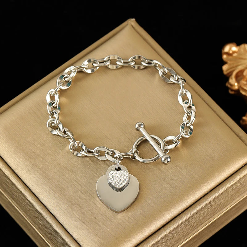Conjunto Feminino de Colar e Pulseira em Aço Inoxidável 316L – Design de Coração, Estilo Trendy