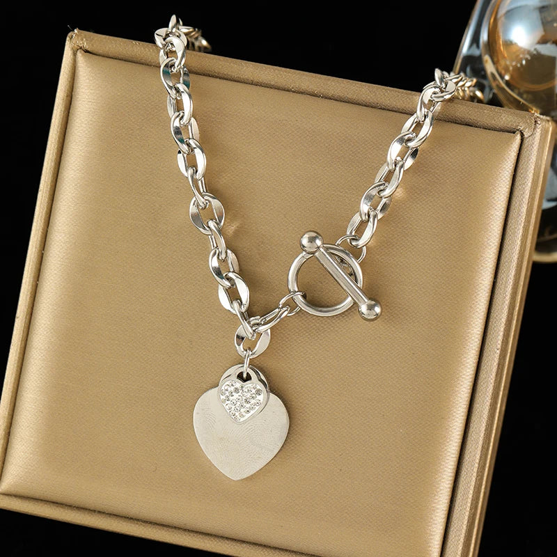Conjunto Feminino de Colar e Pulseira em Aço Inoxidável 316L – Design de Coração, Estilo Trendy